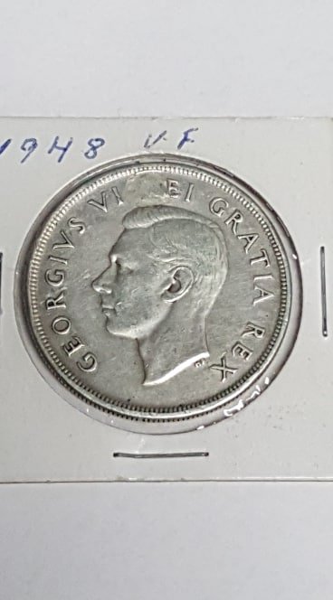 1948-Impaired-Silver-Dollar-Value?